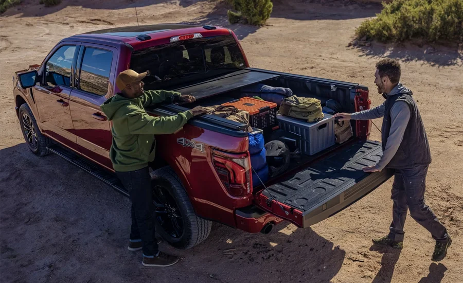 F-150 - A Truck Built to Work Smarter and Harder People Loading Tailgate of F-150