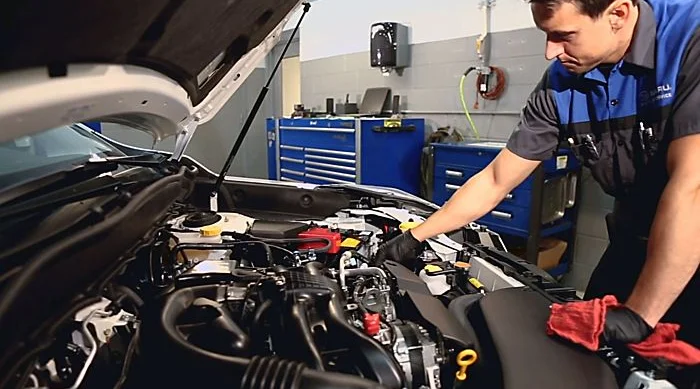 Milea Subaru Service Center Service Tech Checking Oil