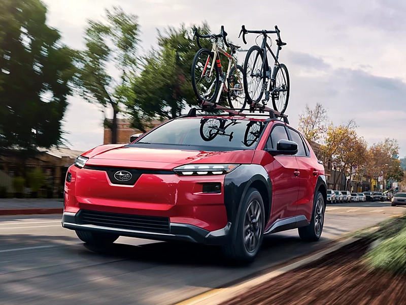 Subaru Delivery Subaru Solterra with bikes on the roof