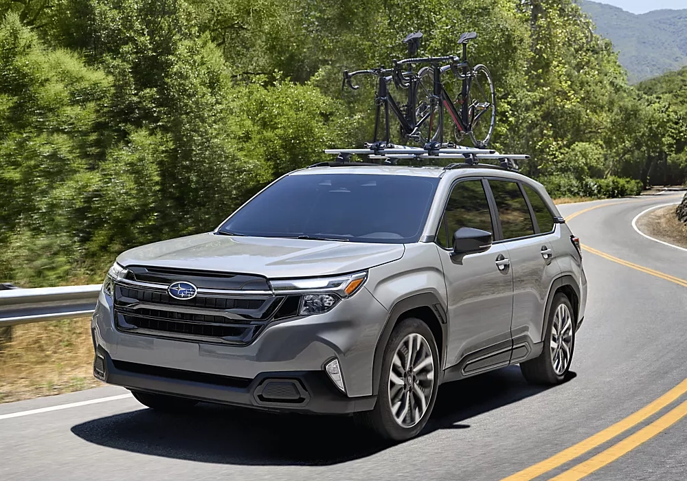 Subaru Forester driving with bikes on the roof