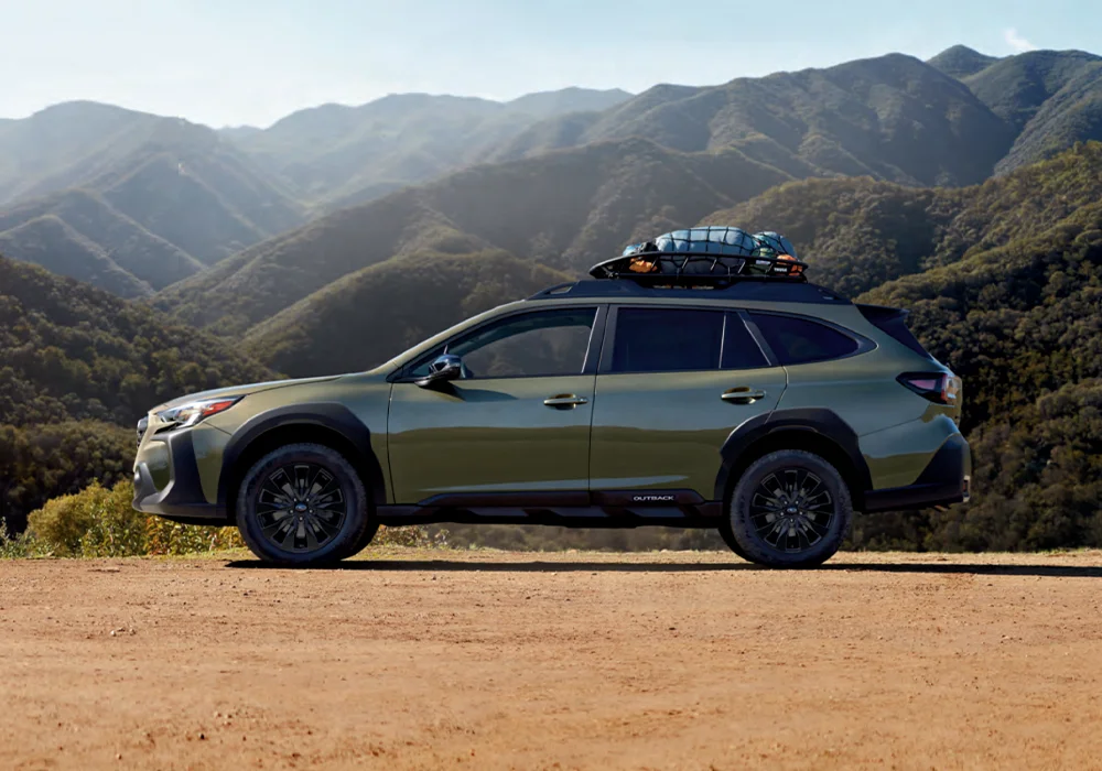 Pre-Owned Subarus Subaru Outback parked near mountains