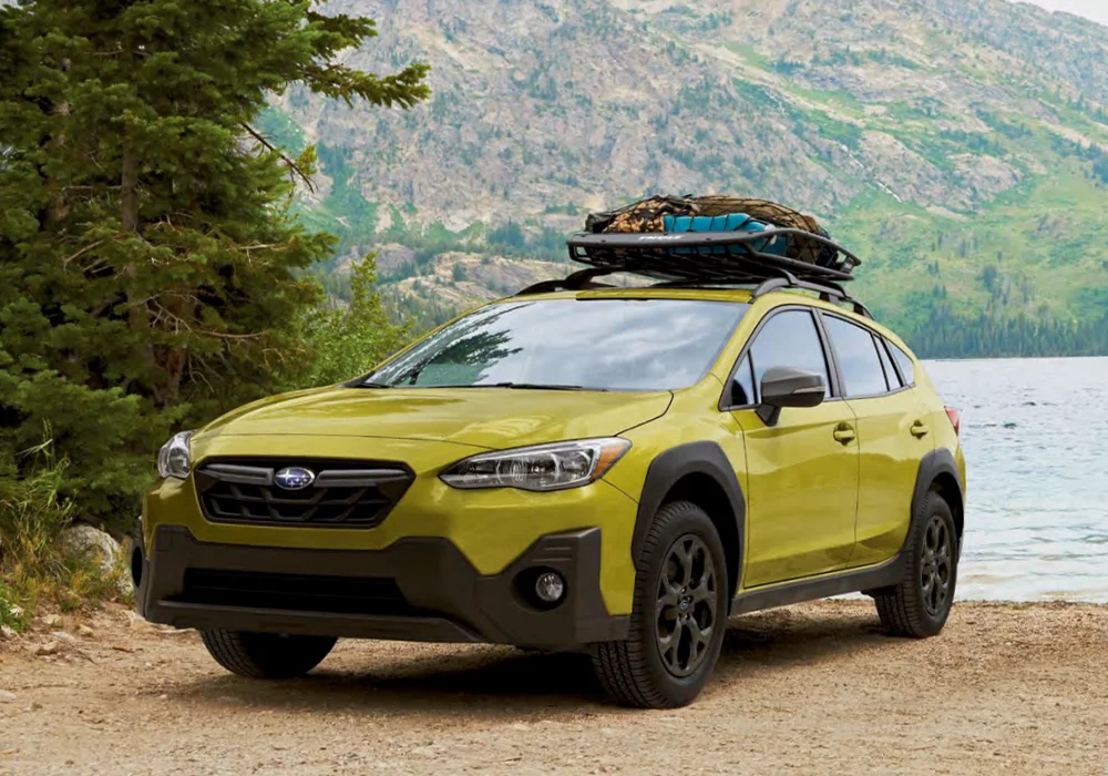 Pre-Owned Subarus Subaru Crosstrek parked near a lake