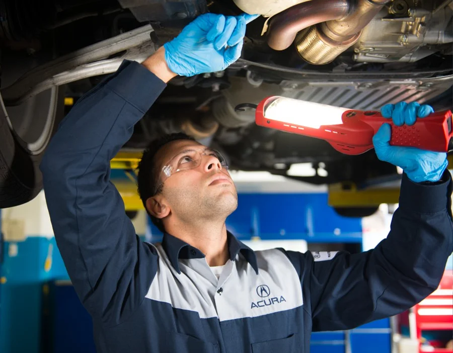 Acura technician servicing a vehicle for a Pound Ridge, NY owner at Acura of Stamford