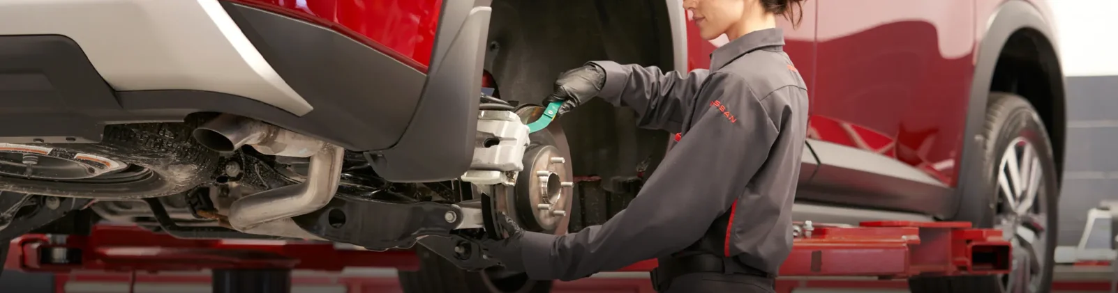 Service Tech Working on Brakes