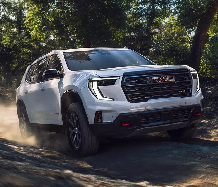 2026 GMC Acadia Driving Down Road