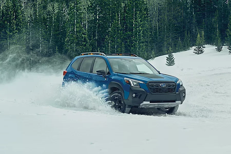 Subaru Forester driving through snow
