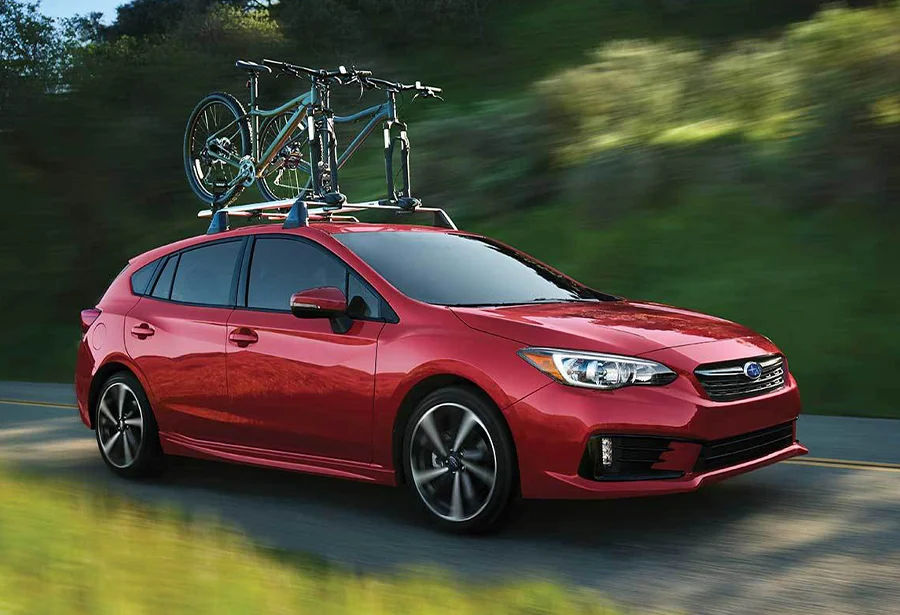 Subaru Impreza with roof rack and Bikes