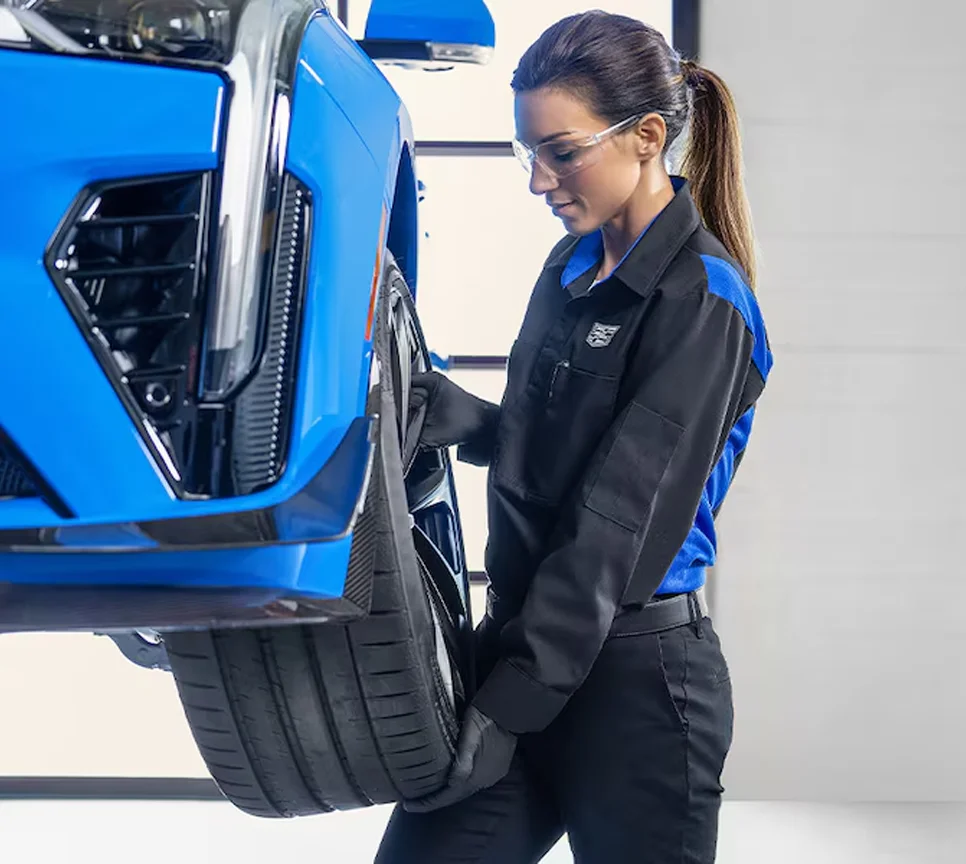 Cadillac service technician Working on a car