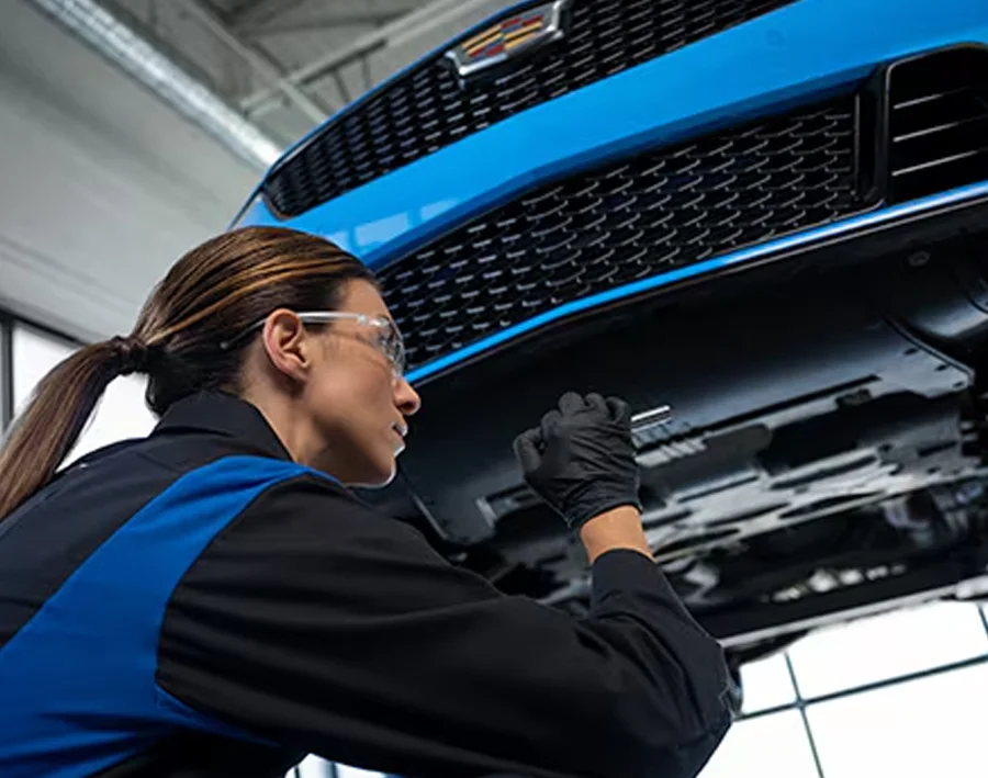 Cadillac service technician Working on a car