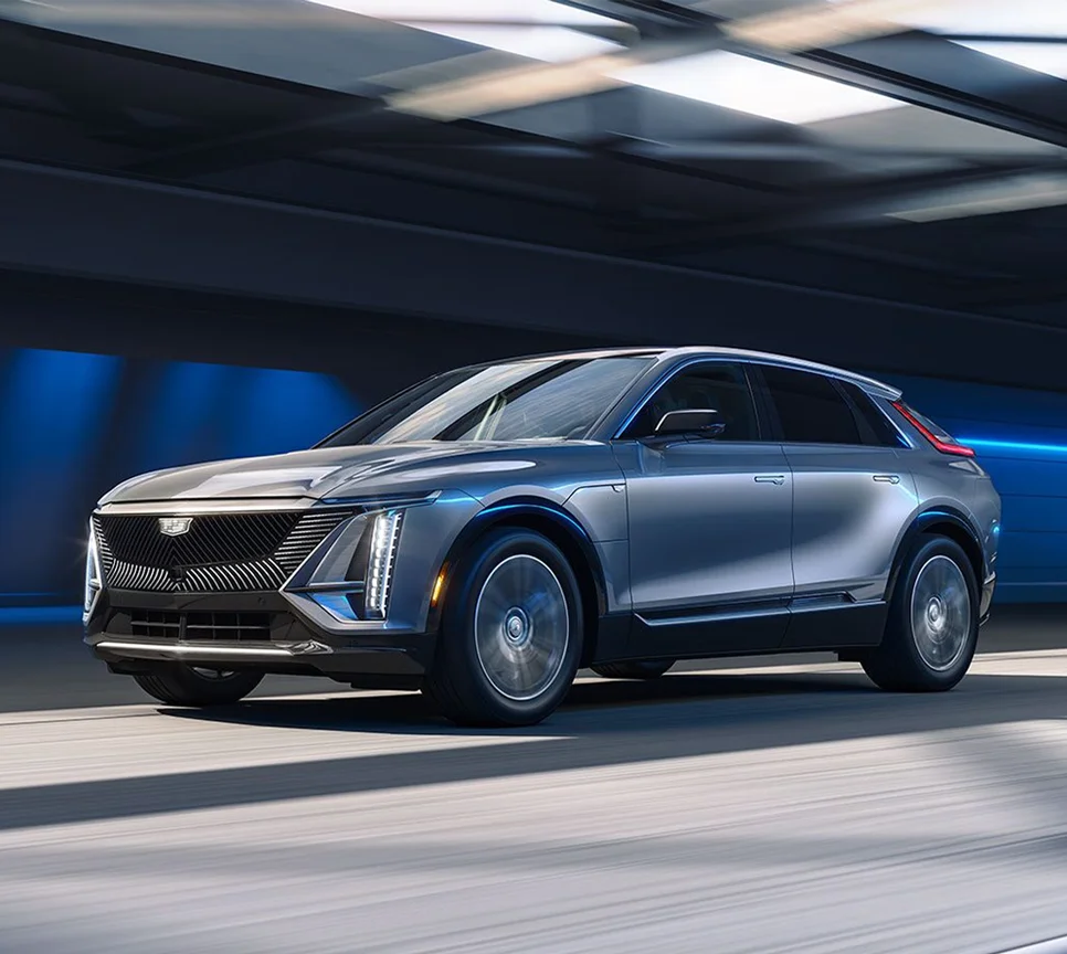 Cadillac LYRIQ Driving Down Road