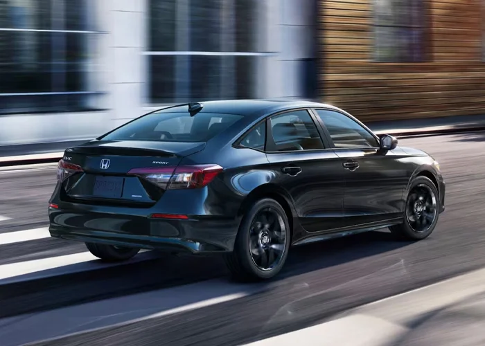 2026 Honda Civic Driving Down Highway