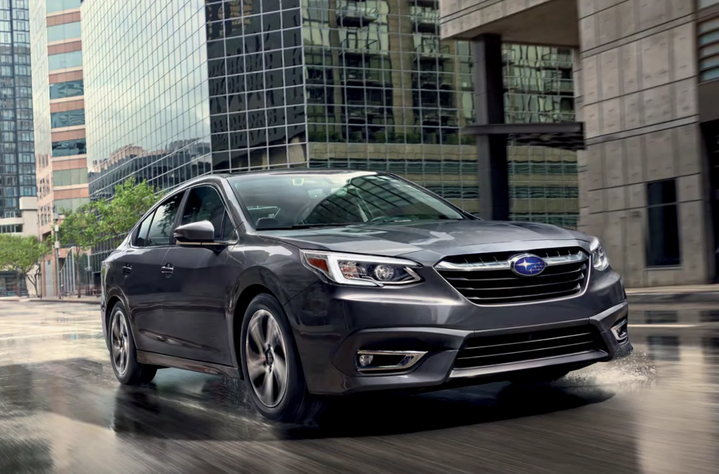 Pre-Owned Subarus Subaru Legacy driving down road