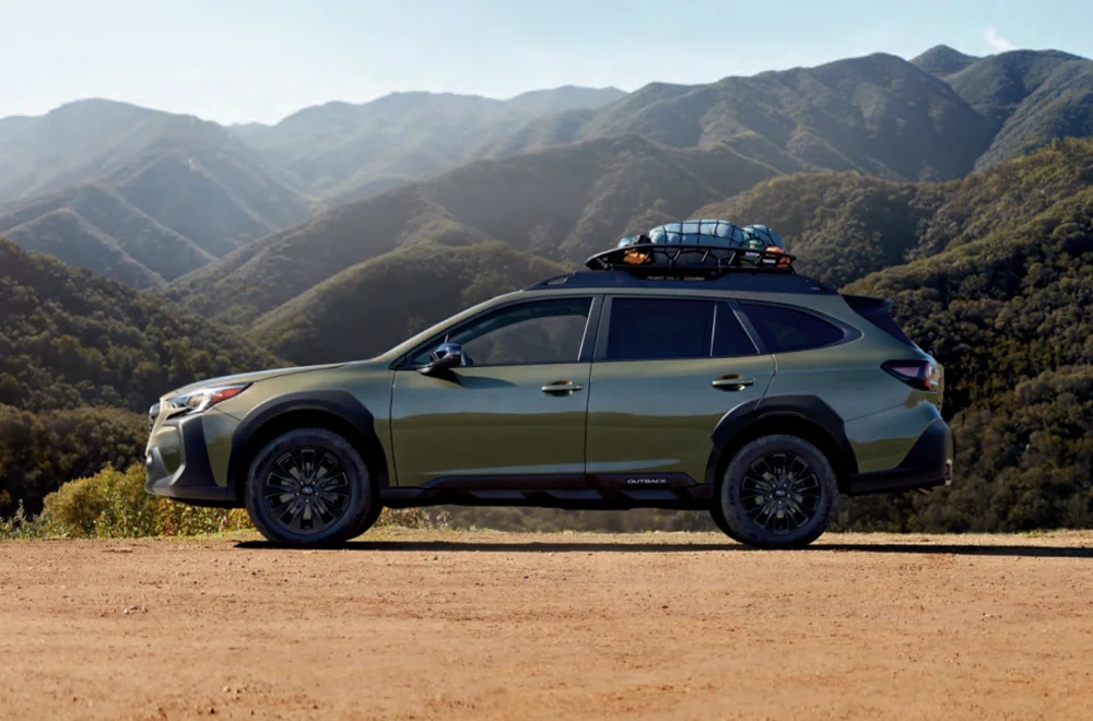 Pre-Owned Subarus Subaru Outback parked on a dirt road
