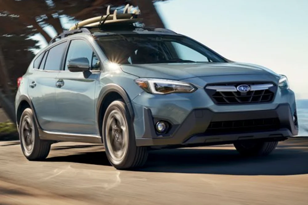 Subaru Impreza Driving down Road