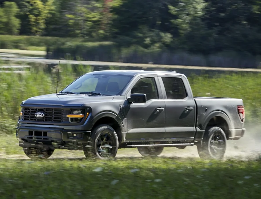 Ford F-150 Driving Across Road