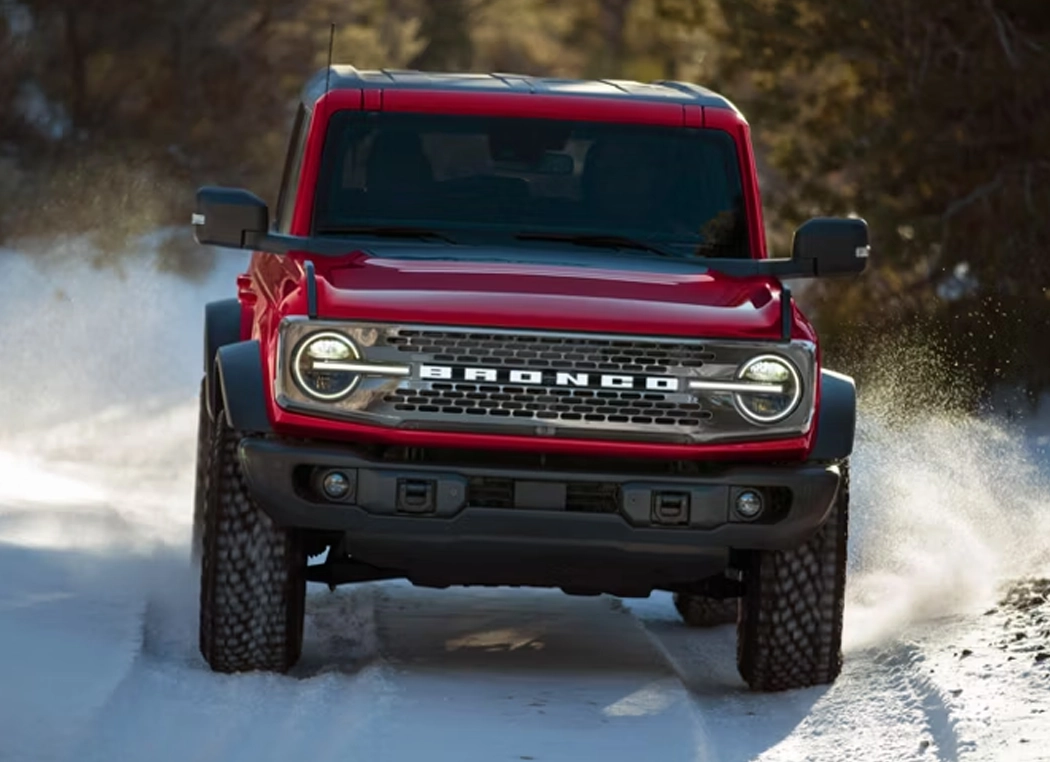 Ford Bronco driving in snow