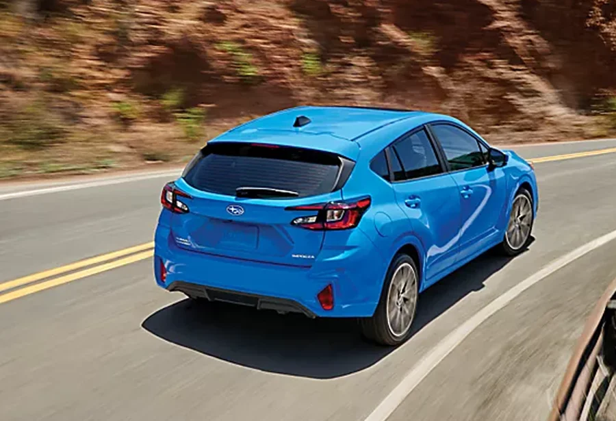 Subaru Impreza driving from the back