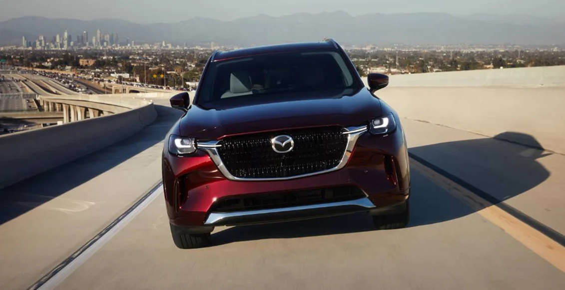 Mazda pulling off a highway