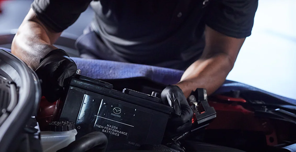Mazda Battery being installed