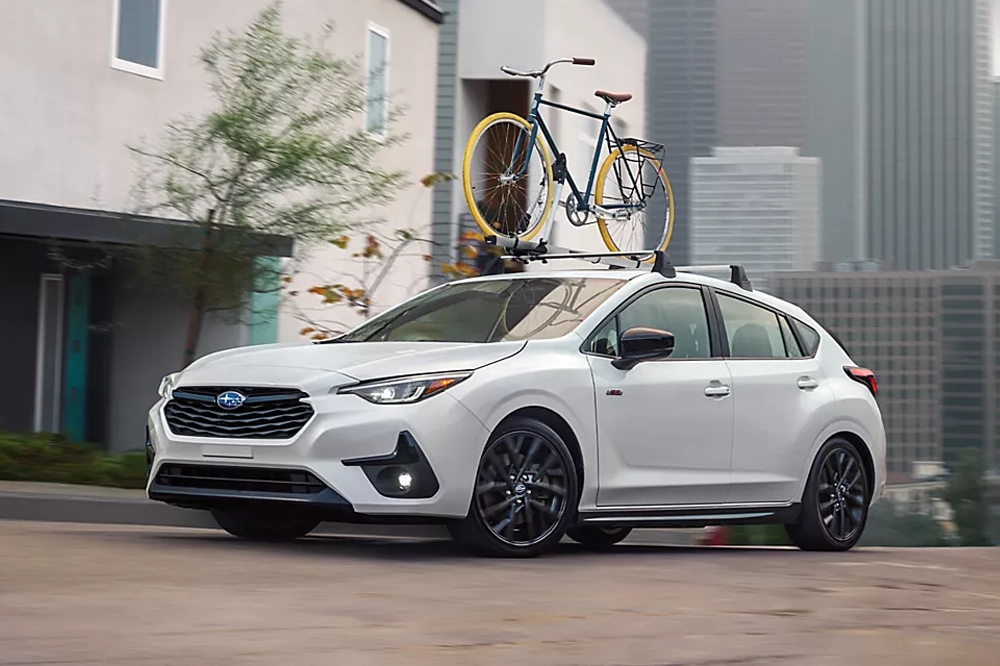 Subaru Impreza with a bike on the roof