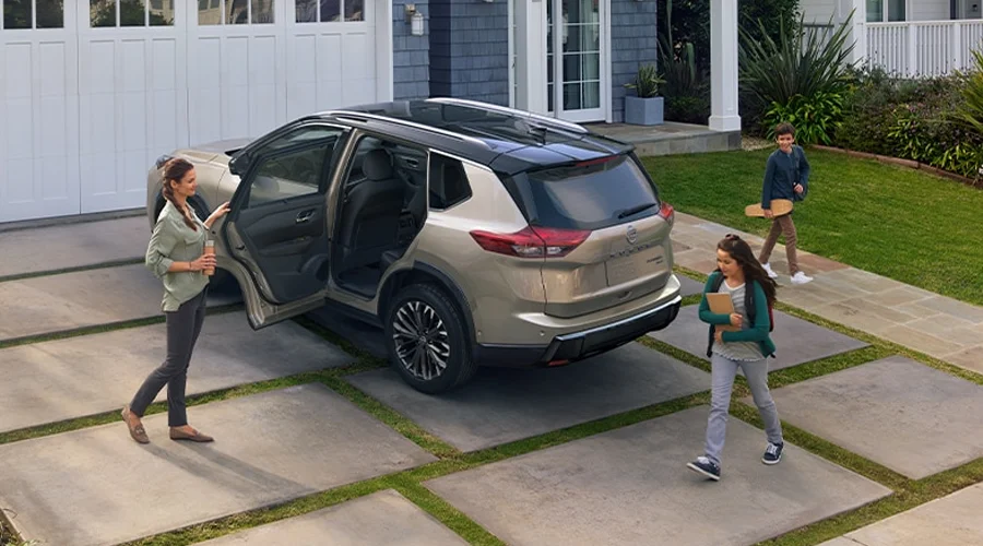 Family Gathering Around Nissan