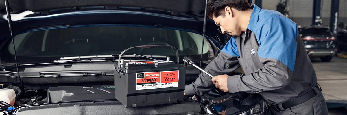 Ford Service Tech working on a car