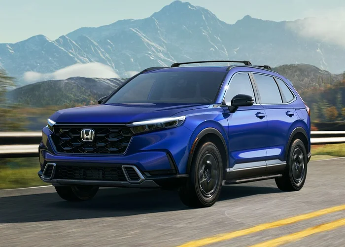 Honda CR-V Driving Down Road