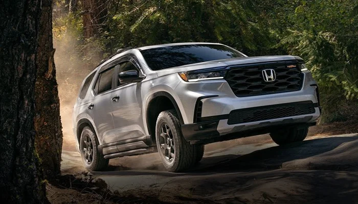 Honda Pilot Driving Up ROcks
