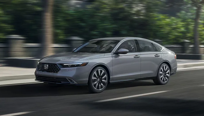 Honda Accord driving down a highway