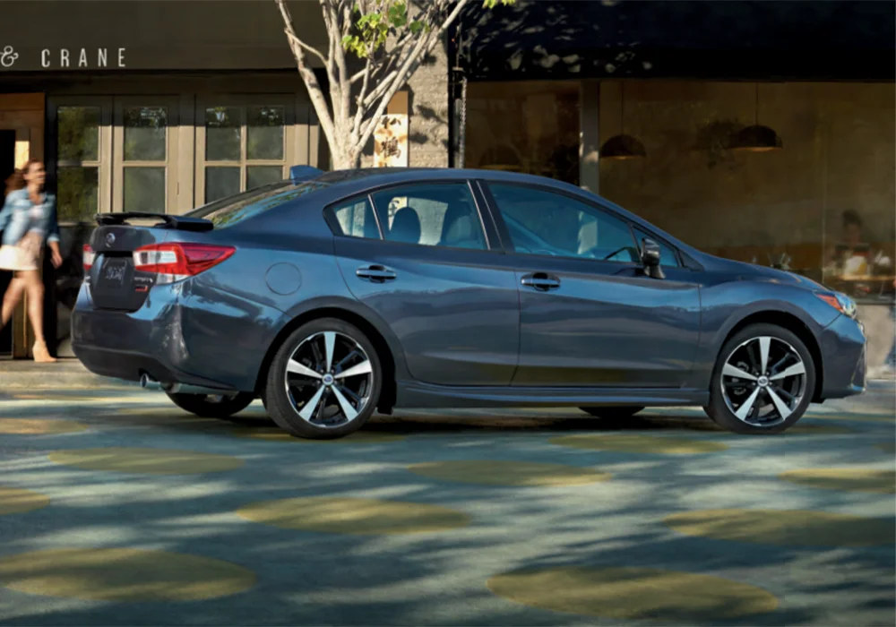 2018 Subaru Impreza parked outside a store