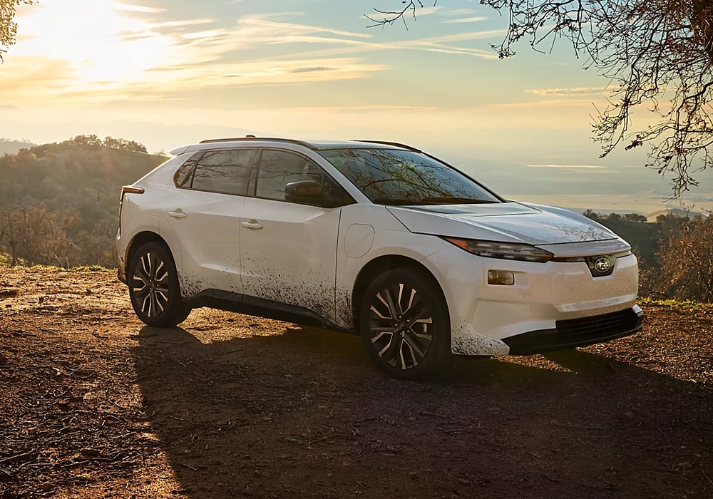 Subaru Solterra parked on a dirt road