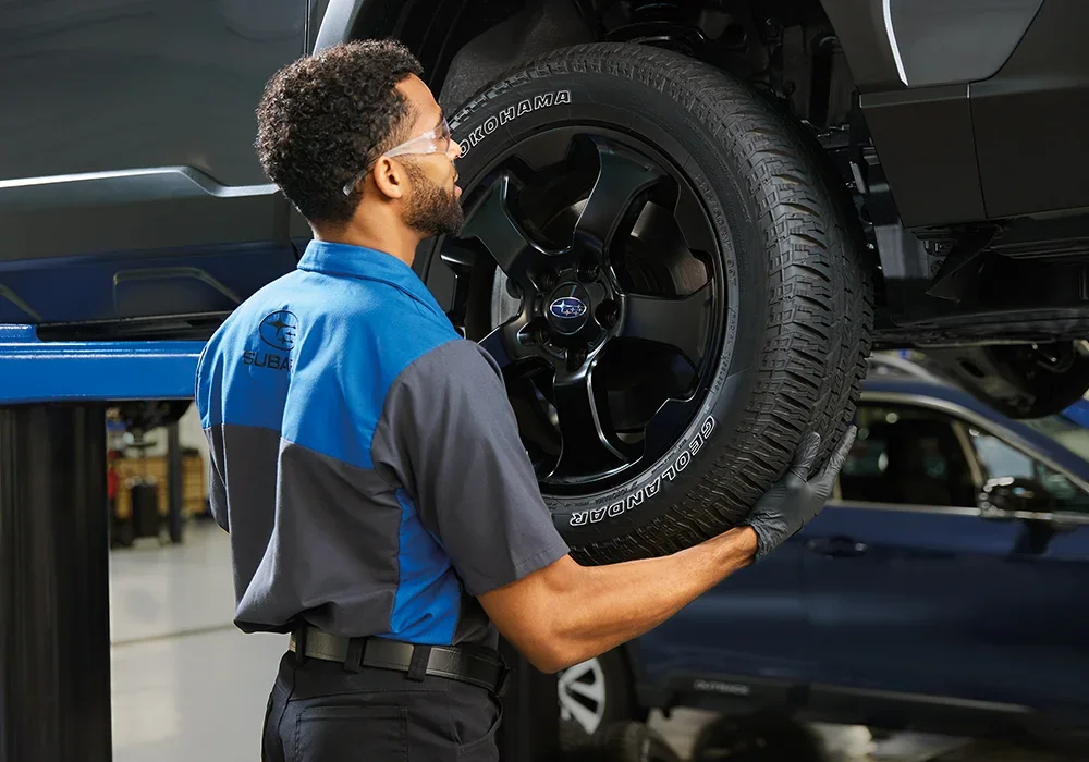 Subaru Tech Changing Tire